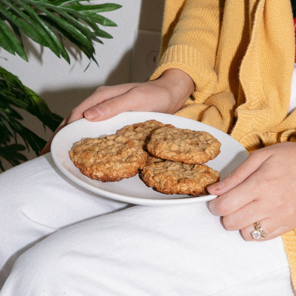 Plate of cookies sitting on a lap